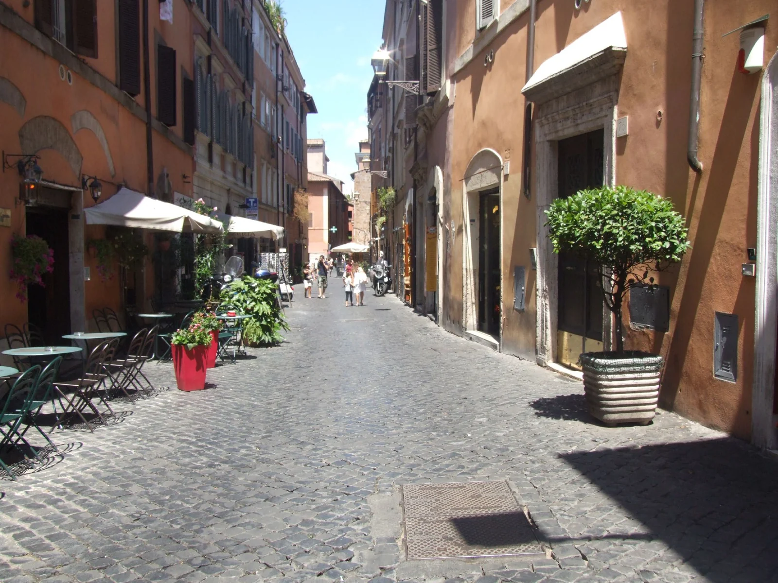 A daytime street scene in Trastevere, Rome